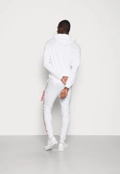 Alpha Industries JOGGER TAPE - Jogginghose - White -Alpha Industries 5d19eeed9af5433f9aef0cb9d829816e