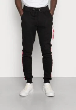 Alpha Industries JOGGER TAPE - Jogginghose - Black -Alpha Industries c8e1881df1c6403890310b163e5da0ad 1