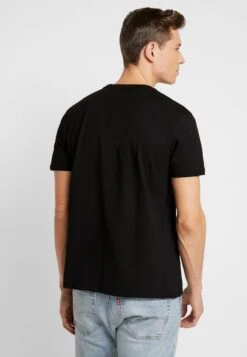 Alpha Industries BASIC SMALL LOGO - T-Shirt Basic - Black / Neon Orange -Alpha Industries f03a8e398af2407b88e7e0bce4b0daca